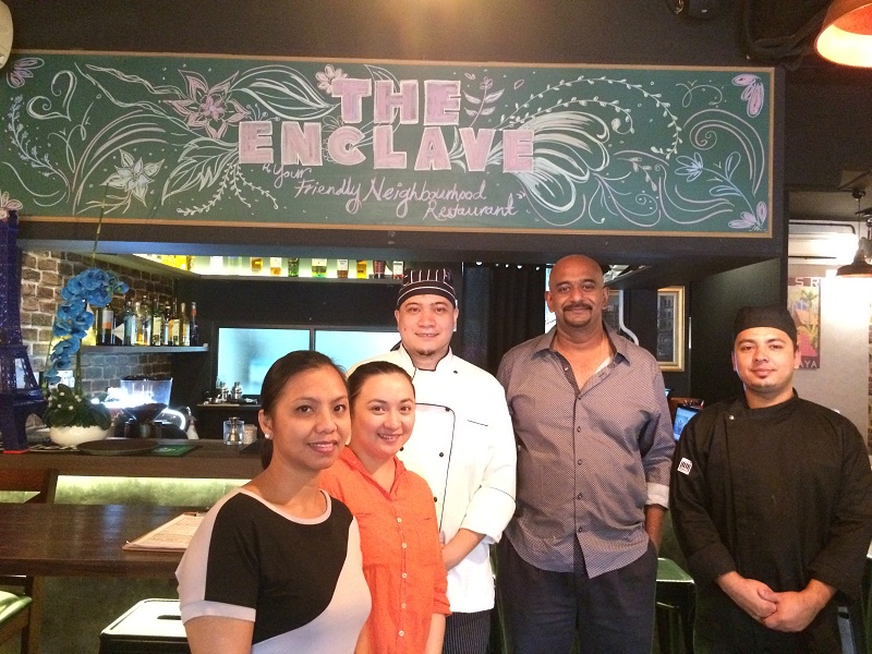 Vignesh Nagenthram (second from right, pictured with his staff) speaks to Malay Mail Online in an interview at his restaurant on January 25, 2017, in Kuala Lumpur. u00e2u20acu201d Picture by Boo Su-Lyn
