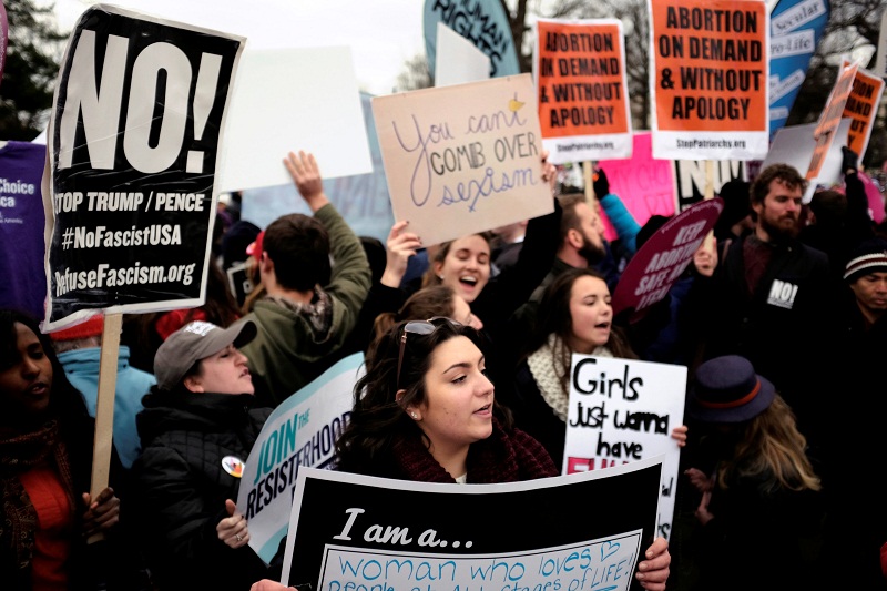 A pro-life marcher stands in front of pro-choice counter-protesters outside the US Supreme Court where the annual March for Life concludes in Washington January 27, 2017.  u00e2u20acu201d Reuters pic