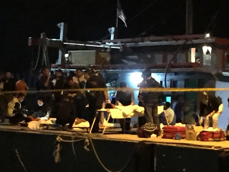 Security and health authorities at the Kota Kinabalu marine police headquarters jetty receive the rescued China tourists at about 1.50am January 30, 2017. u00e2u20acu201d Picture by Julia Chan