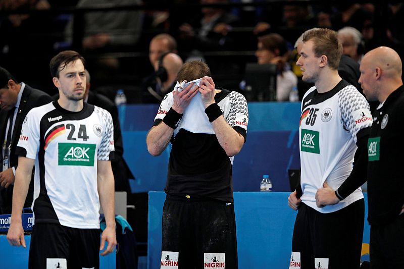 Patrick Groetzki, Steffen Faeth and Julius Kuhn of Germany react at the end of the match after their side lost to Qatar in the 2017 Men's World Championship Second Round, Eighth Finals in Paris, January 22, 2017. u00e2u20acu2022 Reuters pic