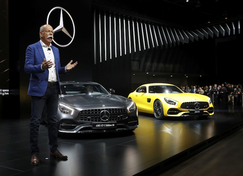 Daimler chairman Dieter Zetsche speaks on the Mercedes stage next to the Mercedes-AMG GT C Edition 50 (left) and the Mercedes-AMG GT S during the North American International Auto Show in Detroit, January 9, 2017. u00e2u20acu201d Reuters pic