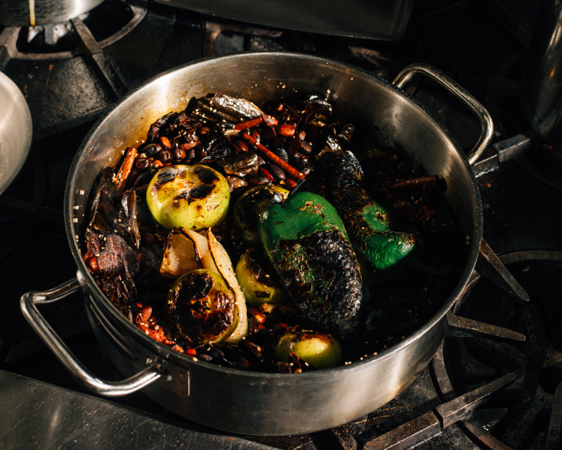 Gerardo Gonzalez chars vegetables for his burned-almond mole, which he pairs with octopus at Lalo, a Mexican restaurant in Manhattan’s Chinatown neighbourhood, January 16, 2017. — Picture by Cole Wilson/The New York Times