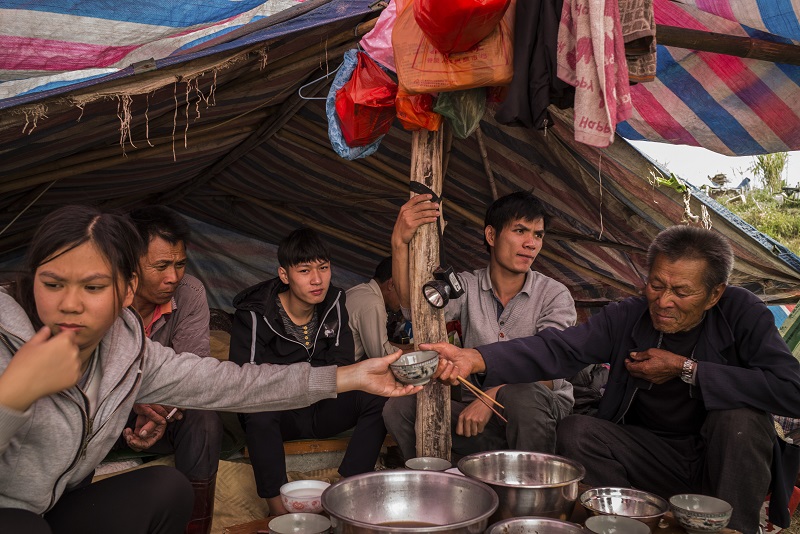 Villagers have lunch in the floating village of Datang, China, January 21, 2017. u00e2u20acu201d Picture by Lam Yik Fei/The New York Times