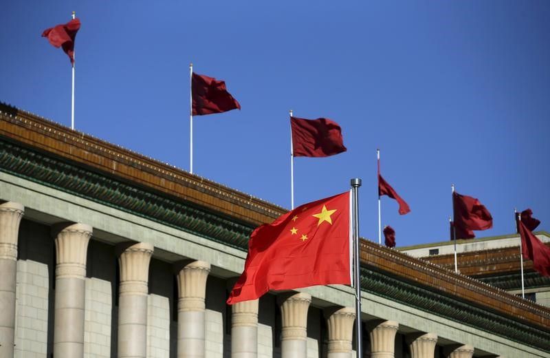 Chinese flag waves in front of the Great Hall of the People in Beijing, China, October 29, 2015. u00e2u20acu201d Reuters pic