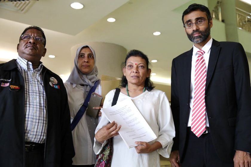 Prabagaran Srivijayanu00e2u20acu2122s mother Eswary Vengatasamy, pictured with lawyer N. Surendran (right), at the Duta court in Kuala Lumpur January 16, 2017. u00e2u20acu201d Picture by Choo Choy May