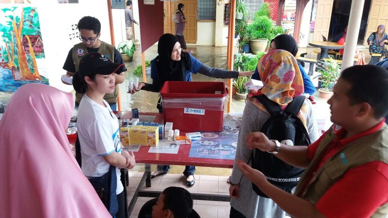 Imaret volunteers handing out medication to flood victims at a relief centre in Kelantan. Jan 6, 2017 — Picture courtesy of Imaret