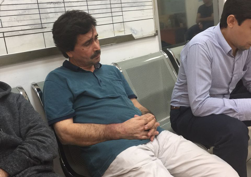 Turkish academic Ismet Ozcelik, 57, is shown here during his arrest on December 13, 2016 after Immigration officers seized his passport, despite him having a valid social visit pass for entry into Malaysia. u00e2u20acu201d Picture courtesy of Suheyl Ozcelik