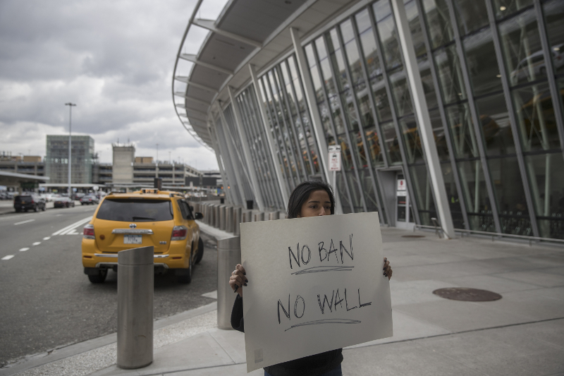 Tara Raghuveer, 24, protests President Donald Trump’s executive order banning Muslims, outside Terminal 4 at John F. Kennedy International Airport, January 28, 2017.