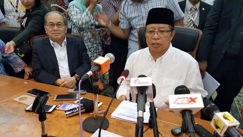 Sarawak Deputy Chief Ministers Datuk Amar Abang Johari Openg (right) and Datuk Amar Douglas Uggah at a press conference in Kuching to officially announce the death of Chief Minister Tan Sri Adenan Satem, January 11, 2017. u00e2u20acu201d Picture by Sulok Tawie