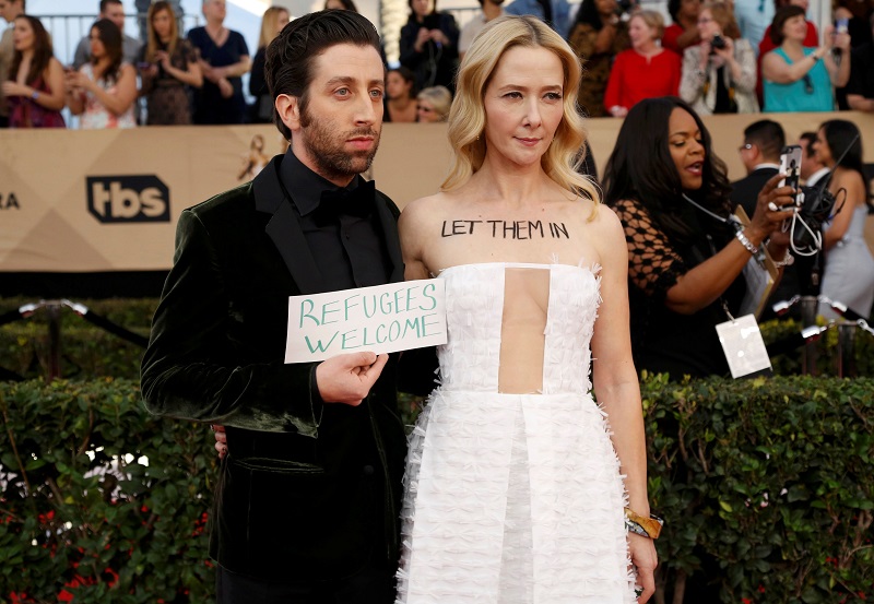 Actor Simon Helberg and his wife actress Jocelyn Towne make a political statement about the current US restriction on refugees as they arrive at the 23rd Screen Actors Guild Awards in Los Angeles, California  January 30, 2017. u00e2u20acu201d Reuters pic