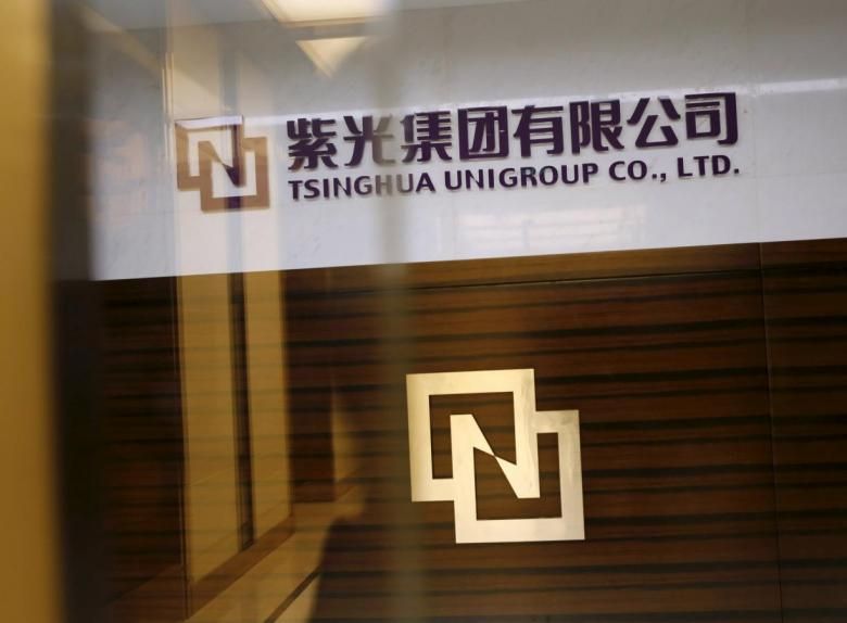 Tsinghua Unigroupu00e2u20acu2122s logo is seen at its office in Beijing, November 15, 2015. u00e2u20acu201d Reuters pic