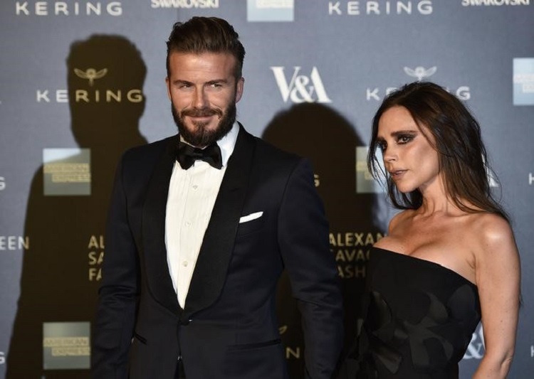 Victoria and David Beckham arrive for the Alexander McQueen: Savage Beauty exhibition gala at the Victoria & Albert Museum in London, March 12, 2015. — Reuters pic