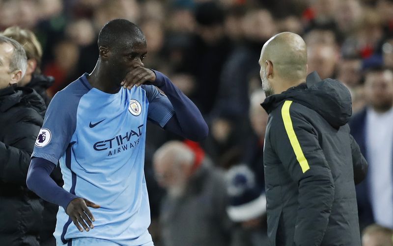Liverpool v Manchester City - Premier League - Anfield - 31/12/16 Manchester City's Yaya Toure and Manchester City manager Pep Guardiola Action Images via Reuters 