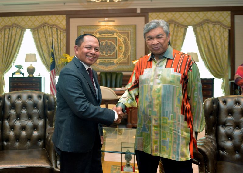 Deputy Prime Minister Datuk Seri Dr Ahmad Zahid Hamidi greets Herman Prayitno receiving a farewell visit by Indonesian Ambassador to Malaysia Herman Prayitno, in the formeru00e2u20acu2122s office at Putrajaya, January 26, 2017. u00e2u20acu201d Bernama pic