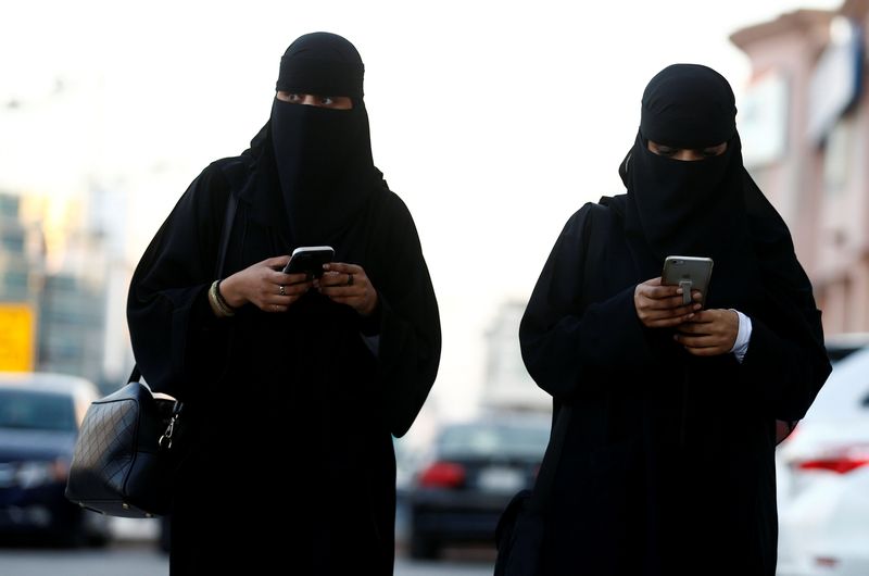 Saudi women use the Careem app on their mobile phones in Riyadh January 2, 2017. — Reuters pic