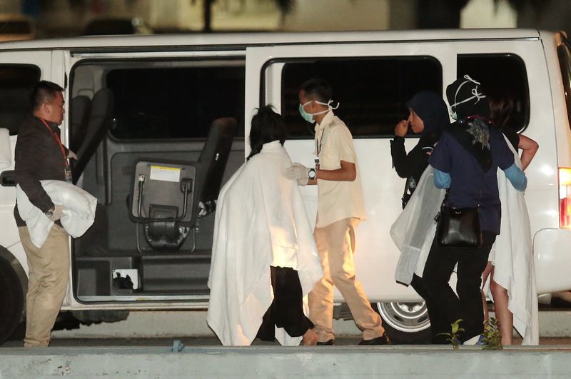 nSurvivors of the catamaran accident are given medical care and examination upon arrival at the Kota Kinabalu marine police jetty January 30, 2017. u00e2u20acu201d Picture by Julia Chan