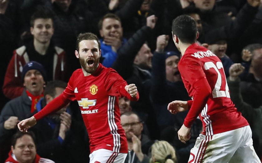 Juan Mata (left) celebrates scoring Manchester Unitedu00e2u20acu2122s first goal against Hull City during the EFL Cup semifinal first leg with Henrikh Mkhitaryan, January 11, 2017. u00e2u20acu201d Reuters pic