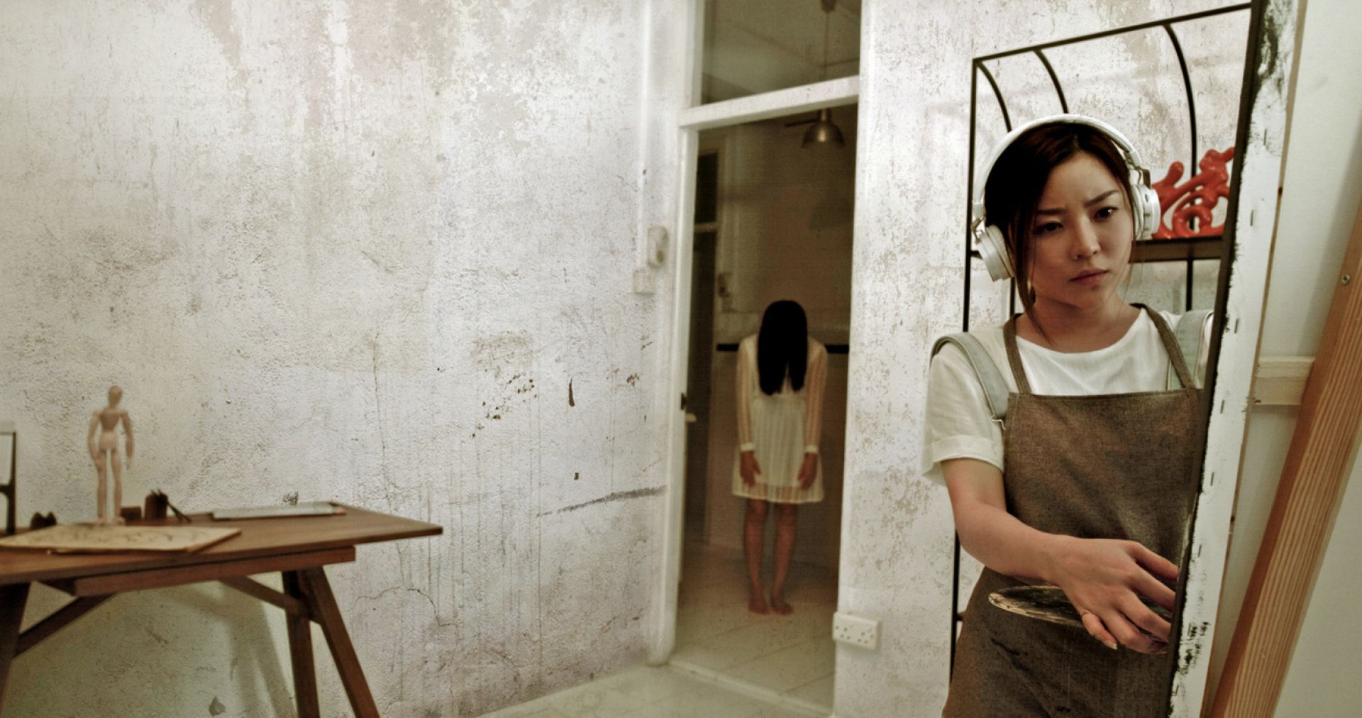 A scene from Mike Kohu00e2u20acu2122s dark psycho thriller 'The Tenants'. The feature film will debut this year, supported by IMDAu00e2u20acu2122s New Talent Feature Grant. u00e2u20acu201d Picture courtesy of IMDA