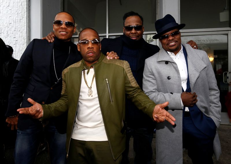 Members of New Edition (from left) Ronnie DeVoe, Michael Bivins, Bobby Brown and Ricky Bell before unveiling the band's star on the Hollywood Walk of Fame in Los Angeles January 23, 2017. — Reuters pic