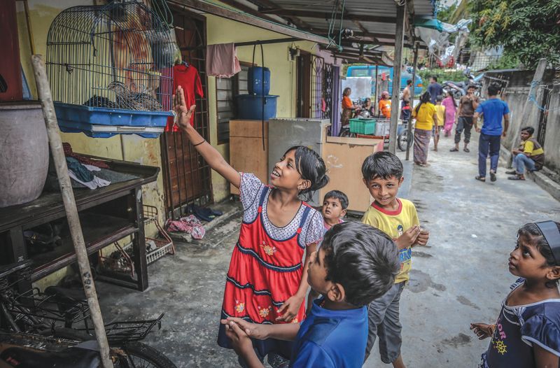 Children play outside their homes in Kampung Tasik Permai. Many of them get sick because of the unhygenic living conditions. u00e2u20acu201d Picture by Firdaus Latif