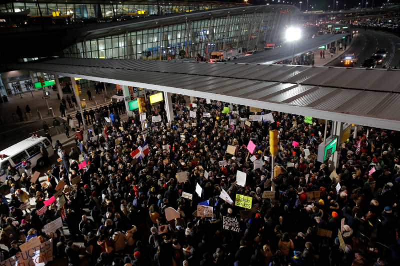 People participate in a protest against Donald Trumpu00e2u20acu2122s travel ban outside Terminal 4 at John F. Kennedy International Airport in Queens, New York January 28, 2017. u00e2u20acu201d Reuters pic