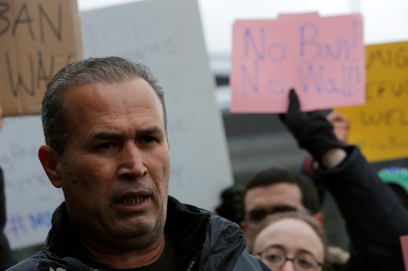 Iraqi immigrant Hameed Darwish addresses the media after being released from Terminal 4 at John F. Kennedy International Airport during the Donald Trump travel ban in Queens, New York January 28, 2017.