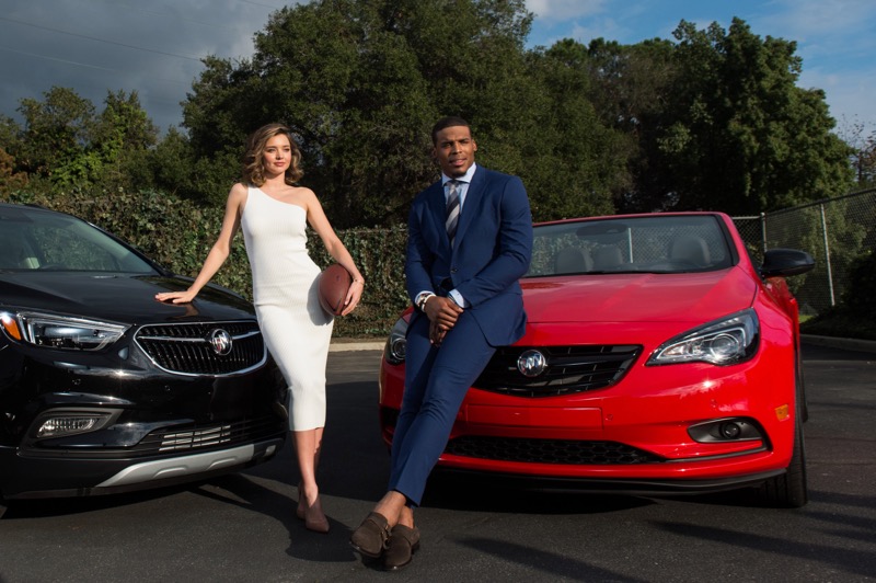 Quarterback Cam Newton #1 of the Carolina Panthers (left) and model Miranda Kerr pose for a photo at 'Buick Super Bowl ad featuring the cascada and encore with football star Cam Newton and supermodel Miranda Kerr on January 13, 2017 in Los Angeles, Califo