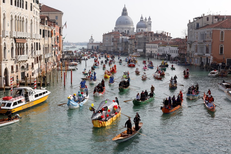 Venetians row during the masquerade parade on the Grand Canal during the carnival in Venice, Italy, February 12, 2017. u00e2u20acu201d Reuters pic