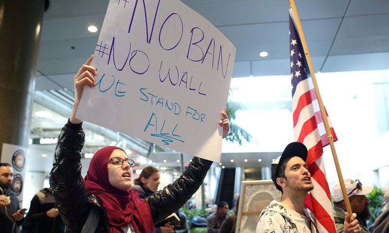 People gather tou00c2u00a0protestu00c2u00a0against US President Donaldu00c2u00a0Trump's executive orderu00c2u00a0travelu00c2u00a0banu00c2u00a0at Los Angeles International Airport (LAX), California January 31, 2017. u00e2u20acu201d Reuters pic