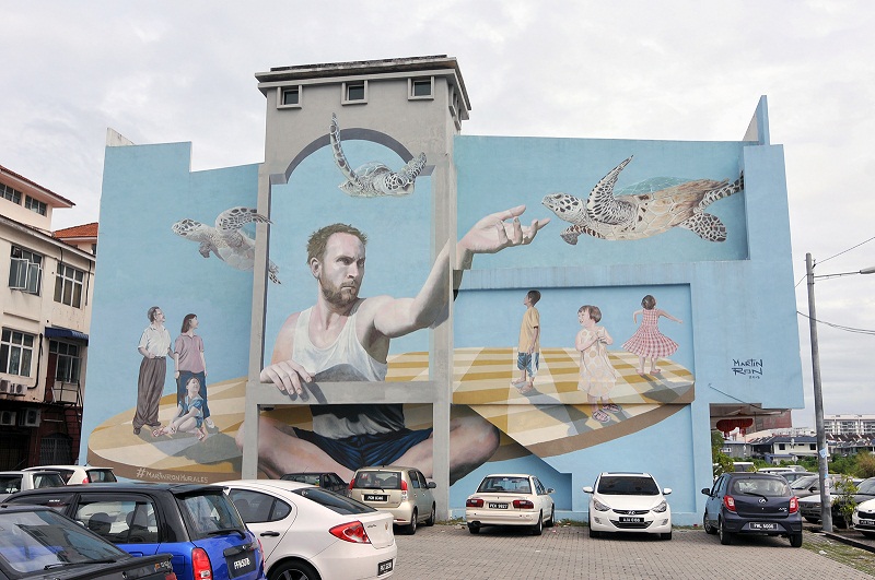 Mural by Martin Ron on the side of a shoplot along Jalan Raja Uda. u00e2u20acu201d Picture by K.E. Ooi