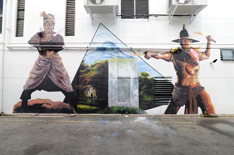 The history of Butterworth depicted through murals along the art alley.