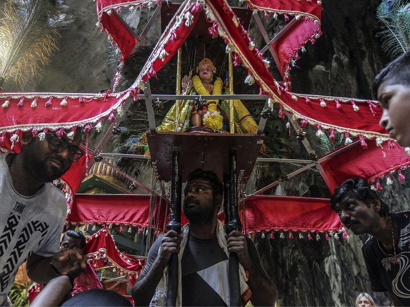 Helpers assist a Hindu devotee to put on a kavadi at the Batu Caves temple in Kuala Lumpur February 5, 2017. u00e2u20acu201d Picture by Yusof Mat Isa