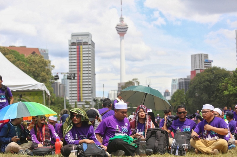A group of people gather at Padang Merbok during the PAS-led Himpunan 355 rally in Kuala Lumpur February 18, 2017. u00e2u20acu201d Picture by Saw Siow Feng