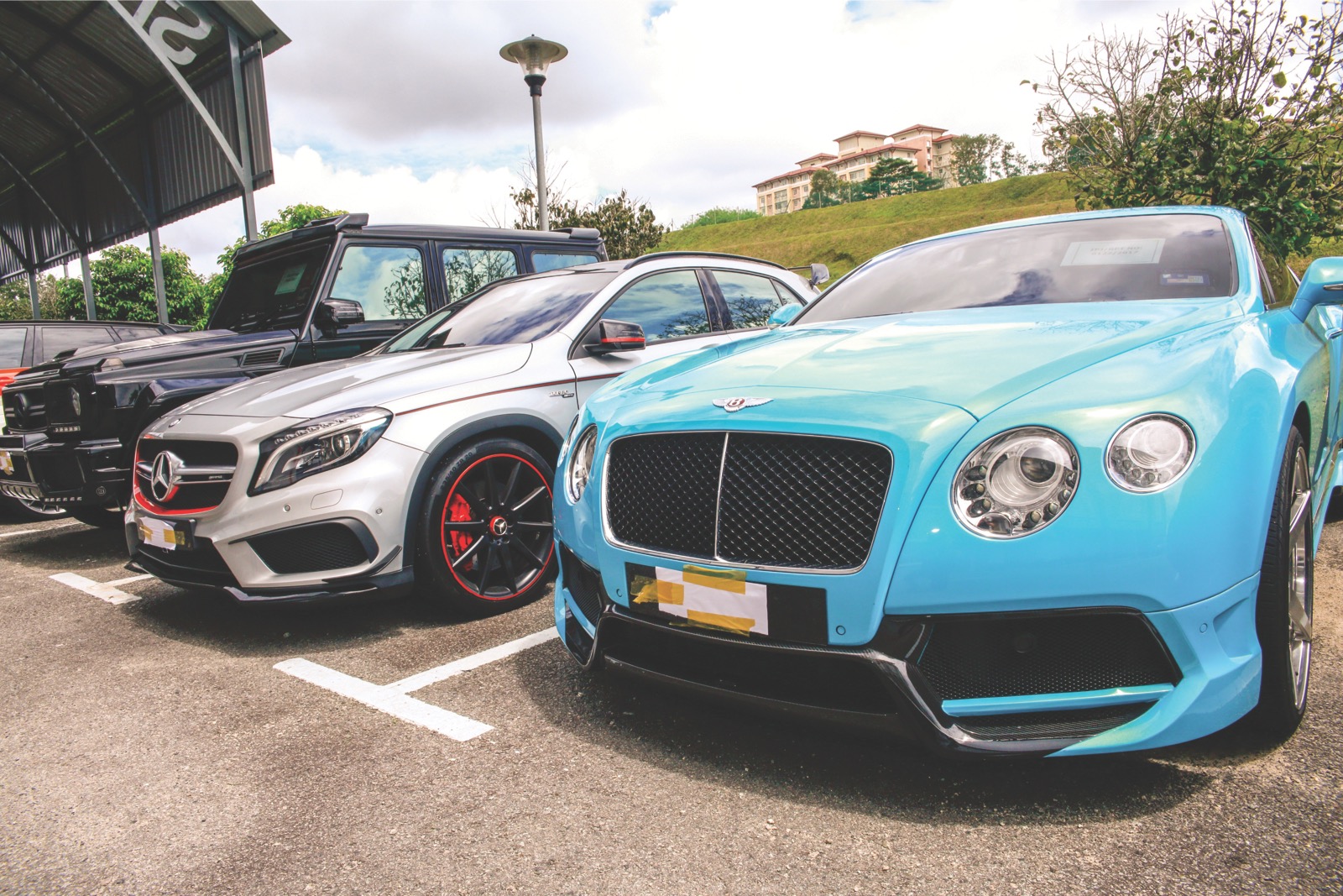The Nissan Skyline (centre) owned  by Ahmad Fauzan. — Picture by Malay Mail