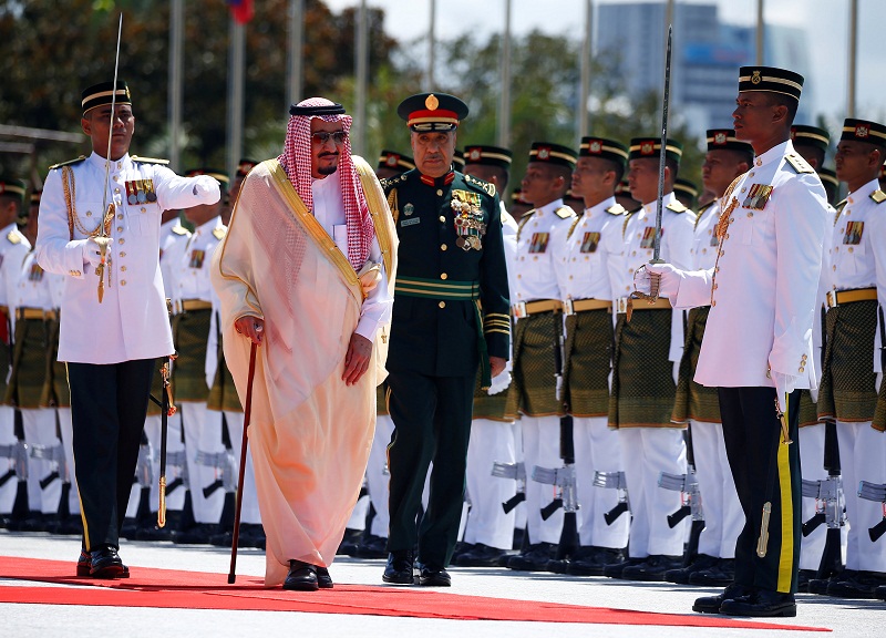 Saudi Arabiau00e2u20acu2122s King Salman inspects an honour guard at the Parliament House in Kuala Lumpur February 26, 2017. u00e2u20acu201d Reuters pic