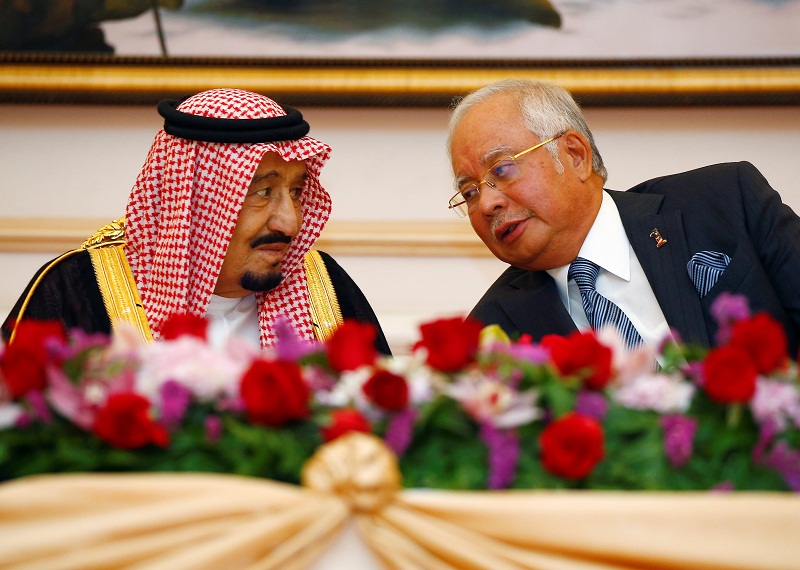 Saudi Arabiau00e2u20acu2122s King Salman speaks with Prime Minister Datuk Seri Najib Razak during a Memorandum of Understanding signing ceremony in Putrajaya February 27, 2017. u00e2u20acu201d Reuters pic