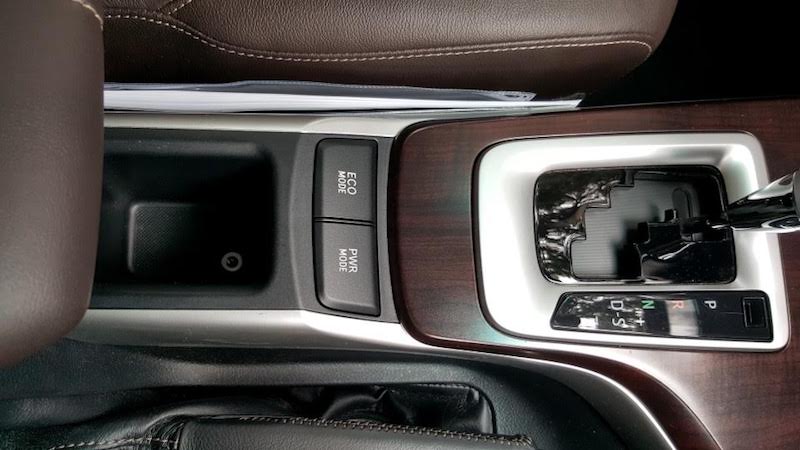 The Eco and Power mode buttons in the Toyota Fortuner. 