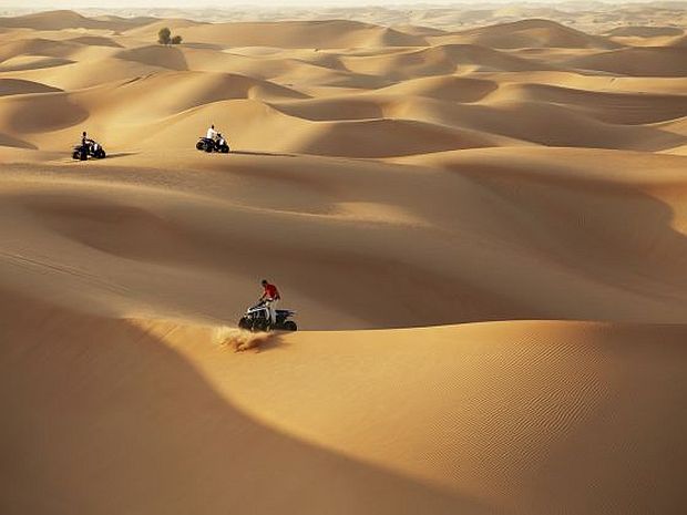 If you prefer to be the driver of your own desert adventures, get on a quad bike or even a sand board and glide down the dunes to experience them first-hand. u00e2u20acu201d   Abu Dhabi Tourism & Culture Authority handout via TODAY
