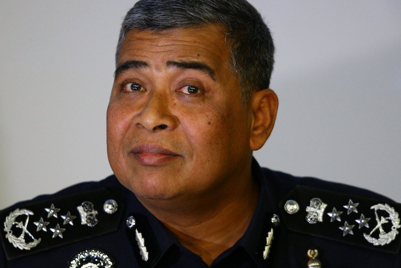Inspector General of Police Tan Sri Khalid Abu Bakar listens during a news conference regarding the apparent assassination of Kim Jong-nam at the Malaysian police headquarters in Kuala Lumpur February 22, 2017. u00e2u20acu201d Reuters pic