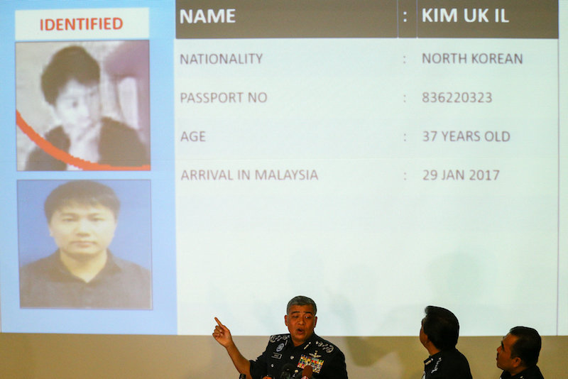 Inspector General of Police Tan Sri Khalid Abu Bakar speaks next to a screen showing North Korean Kim Uk-il during a news conference regarding the apparent assassination of Kim Jong-nam in Kuala Lumpur February 22, 2017.