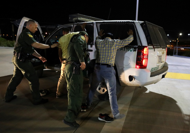 US border patrol agents detain two men from India after they entered the United States by climbing over the border wall from Mexico in Calexico, California, February 8, 2017. u00e2u20acu201d Reuters pic