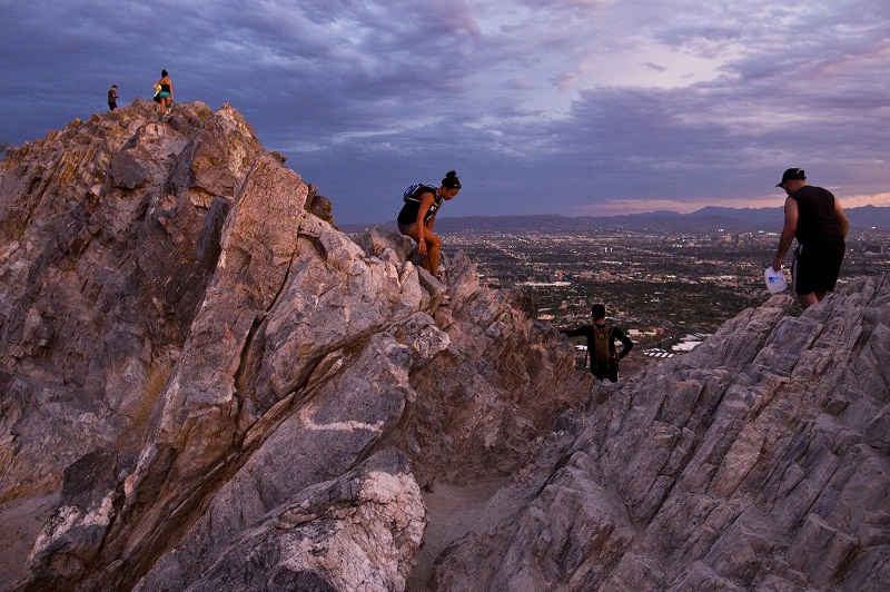 Hikers atop Piestewa Peak in the heart of Phoenix, Ariz., July 28, 2015. — Picture by Nick Cote/The New York Times