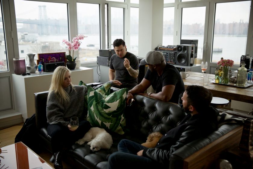 Malay his wife, Iris Belson, invited a couple of guests to their home in New York January 22, 2017. — Picture by Benjamin Norman/The New York Times