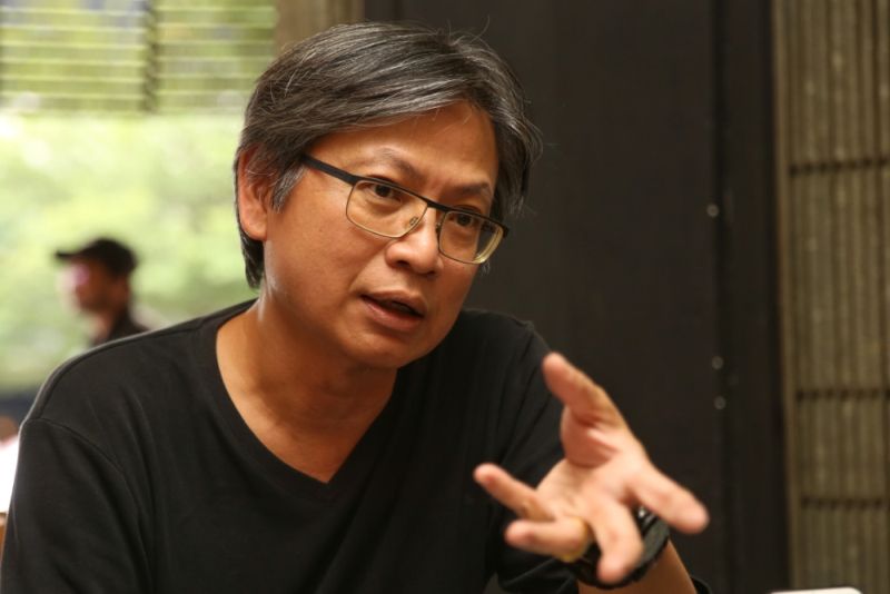 KC Tan, an architect and also the project's co-ordinator, is in charge of overseeing the reconstruction of Rumah Degil.— Pictures by Saw Siow Feng