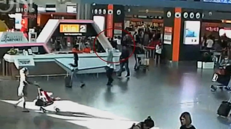 A still image from a CCTV footage appears to show (circled in red) a man purported to be Kim Jong Nam being accosted by a woman in a white shirt at Kuala Lumpur International Airport in Malaysia on February 13, 2017. u00e2u20acu201d Reuters pic