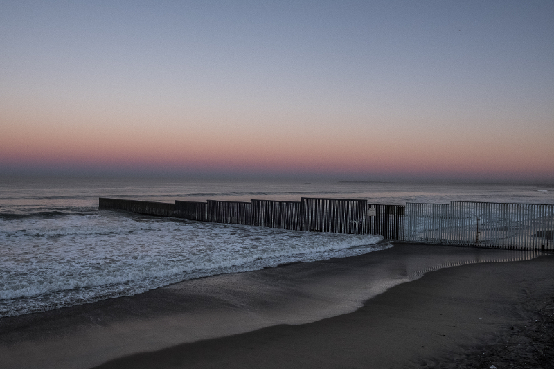 The border fence extents out into the Pacific Ocean in Tijuana January 28, 2017. One resident recalled a few migrants drowning in the surf while trying to cross, subsumed by the waves. — Picture by Bryan Denton/The New York Times