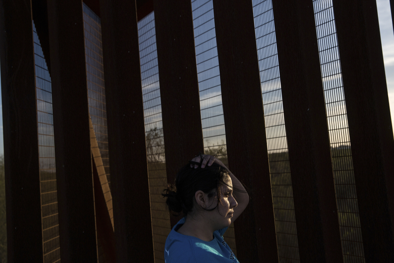 Selena Aguirre, a university student, by the border fence near a decommissioned water-irrigation facility in Hidalgo, Texas, January 26, 2017. u00e2u20acu201d Picture by Tamir Kalifa/The New York Times 
