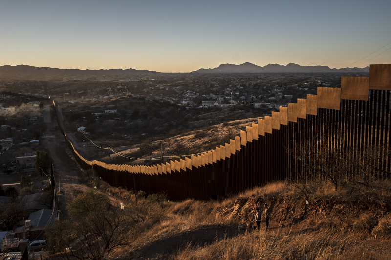 The border wall, here made of tall steel beams in rows, in Nogales January 30, 2017. The current version is new enough that teenagers who grew up here still remember its construction. —Picture by Bryan Denton/The New York Times