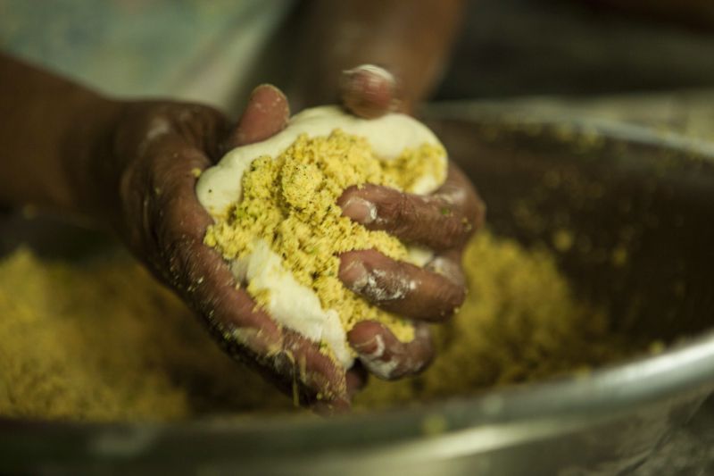 Dhal puri, a roti stuffed with ground split peas, is made at Pope Amin’s roti restaurant San Fernando, Trinidad and Tobago.