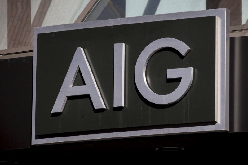 The AIG logo is seen at its building in New York's financial district. u00e2u20acu2022 Reuters pic